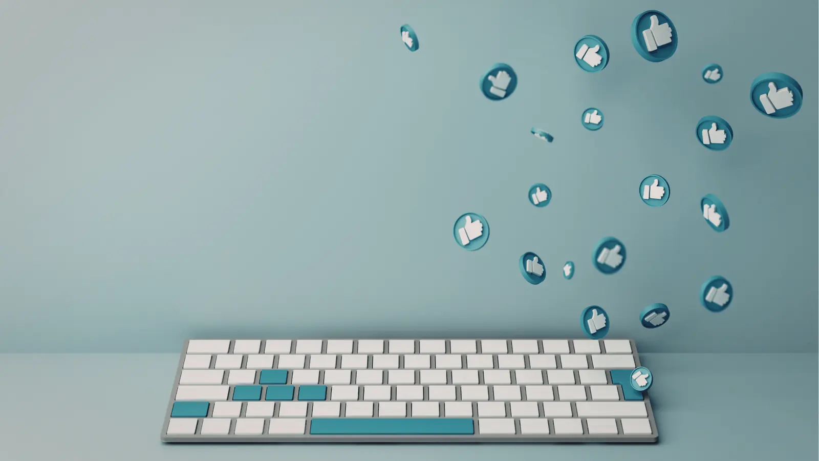 White keyboard with teal keys and floating thumbs-up icons on blue background